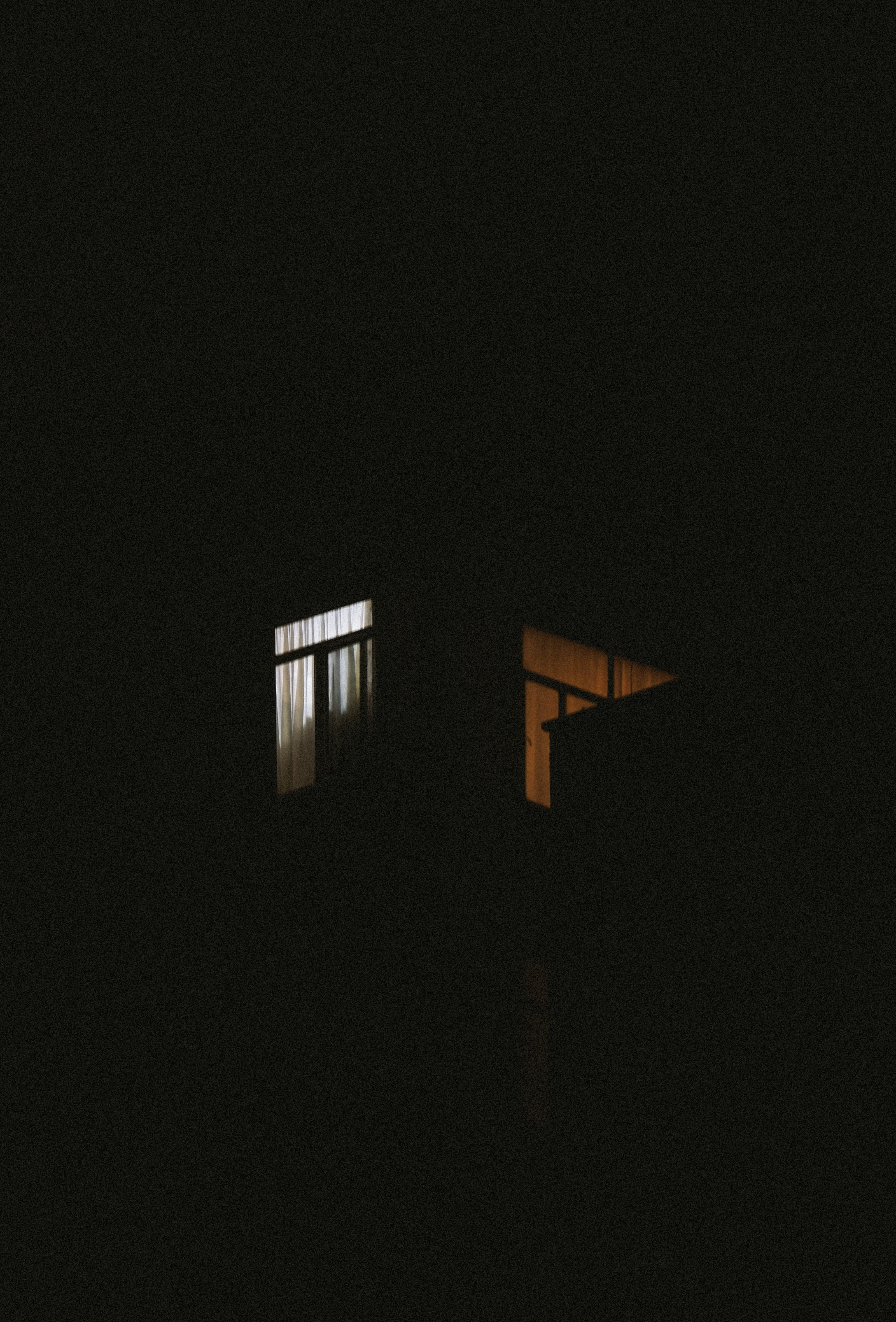 white and brown building during night time